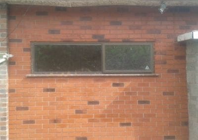 Completed brick layered rendering project with window